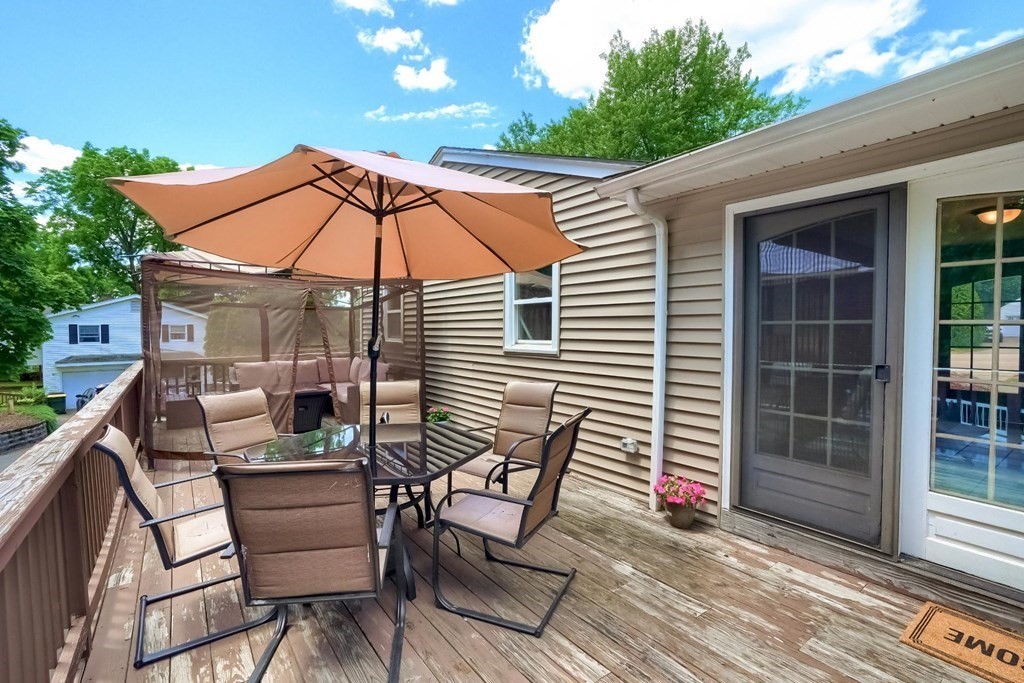 361 South Main Street Bellingham, MA 02019 - Photo 42 of 42 a patio with glass top table and chairs