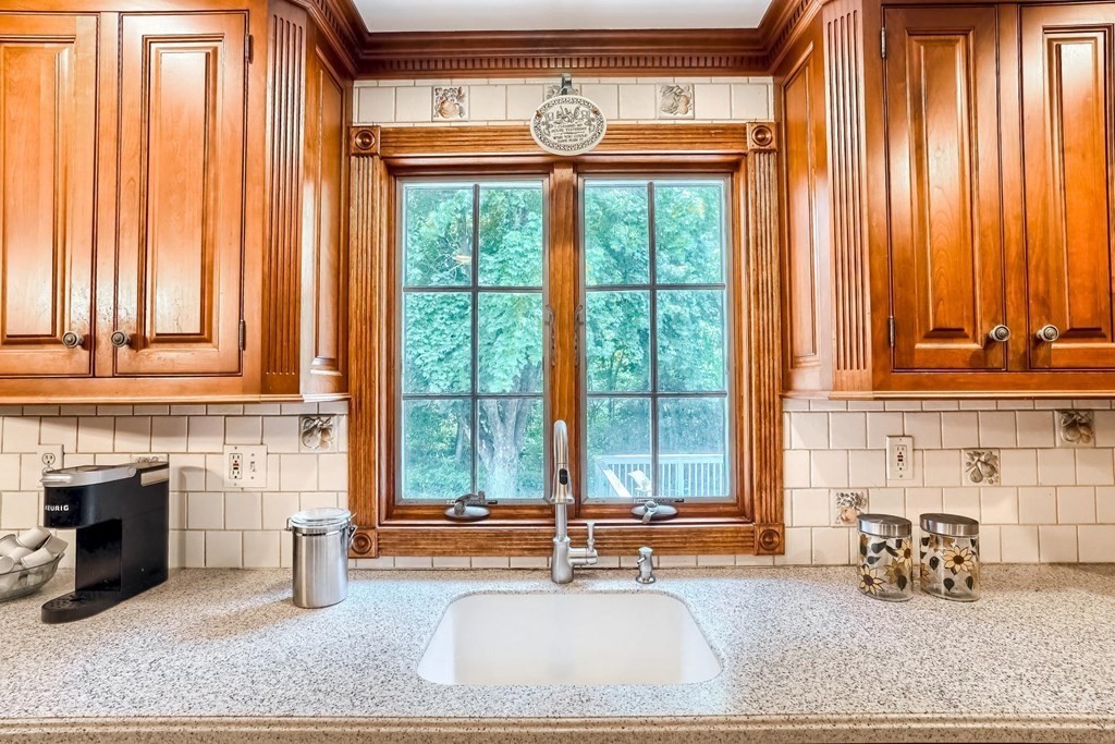 361 South Main Street Bellingham, MA 02019 - Photo 5 of 42 a living room filled with furniture and large windows