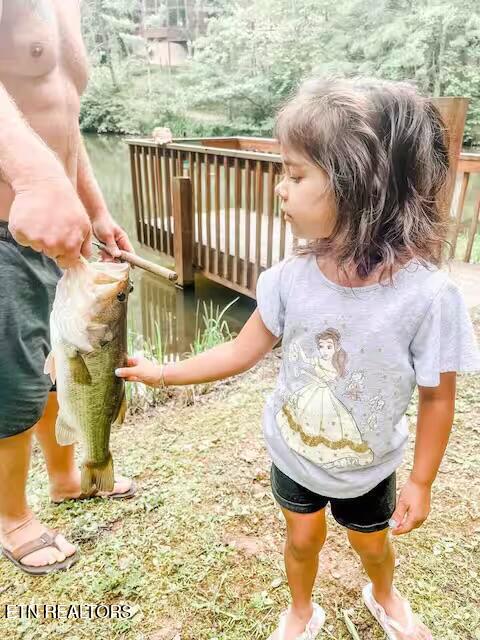 3017 Walters Way Sevierville, TN 37862 - Photo 46 of 52 girl with fish
