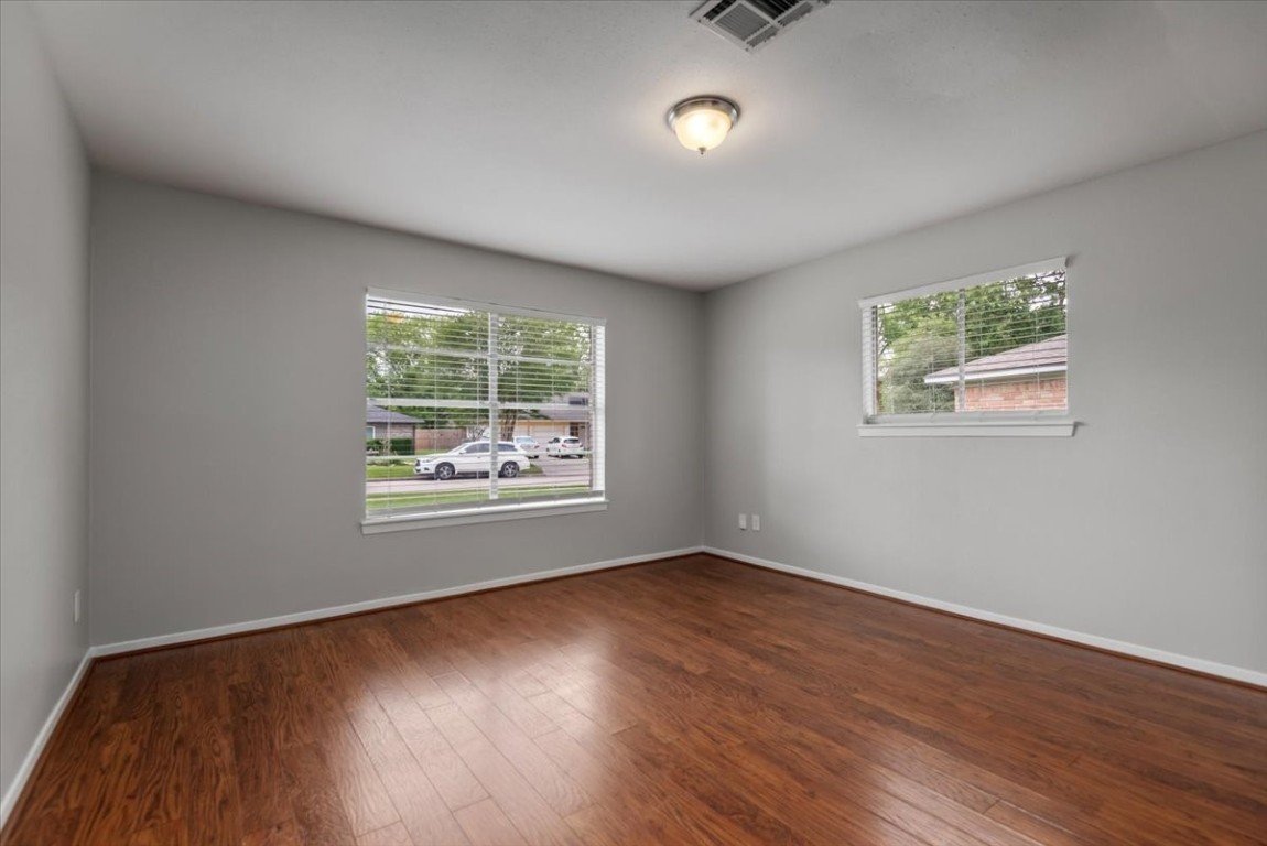 29414 Sedgefield Street Spring, TX 77386 - Photo 4 of 25 Discover the perfect setting for hosting family meals and entertaining guests in this bright and spacious dining room. Continuing the seamless flow from the entryway, this room showcases the wood plank laminate flooring.
Natural light fills the space through two separate windows!