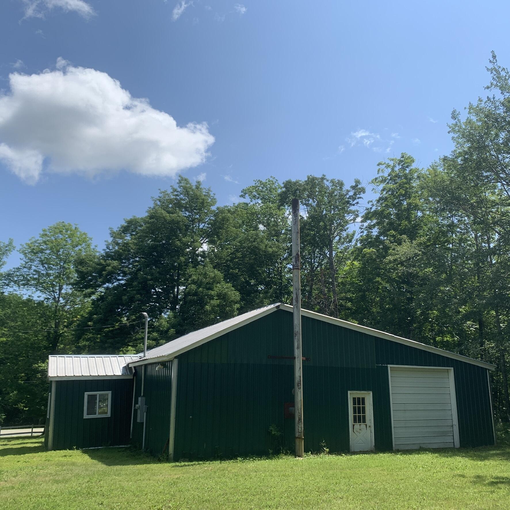 652 Woodville Road Lincoln, ME 04457 - Photo 8 of 13 Side View