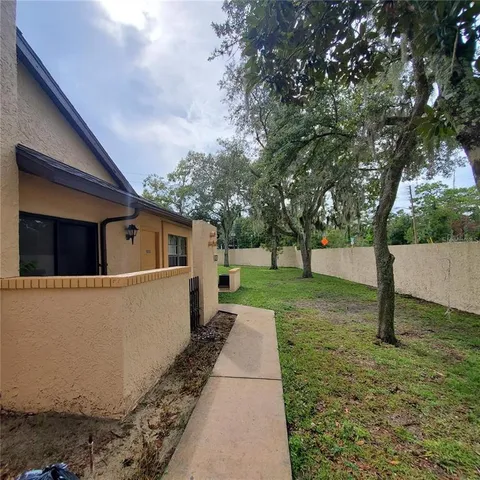a view of a back yard of the house