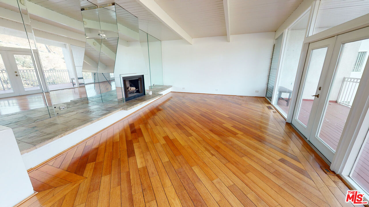 10090 Cielo Drive Beverly Hills, CA 90210 - Photo 4 of 19 a view of a living room