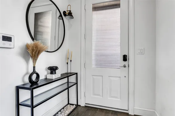 a bathroom with a mirror and a shower