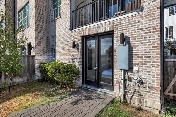 a brick building with a large windows