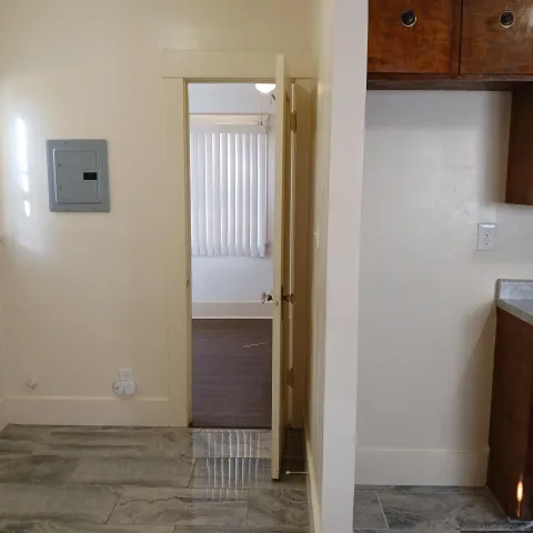 a view of a livingroom from a hallway