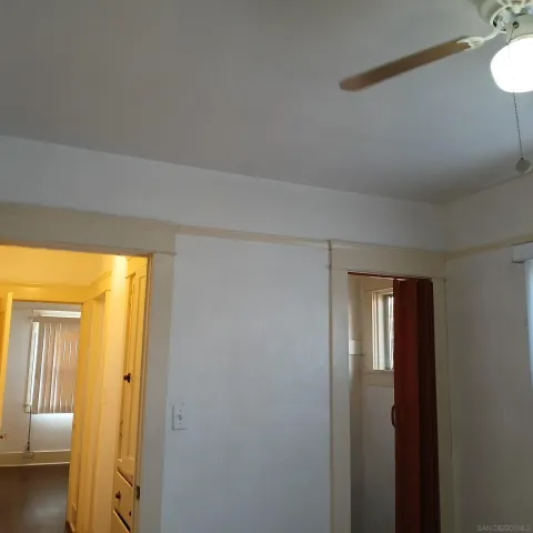 en empty room with windows