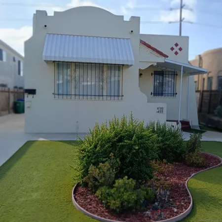 a house view with a garden space