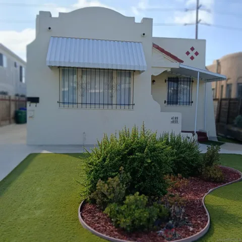 a house view with a garden space