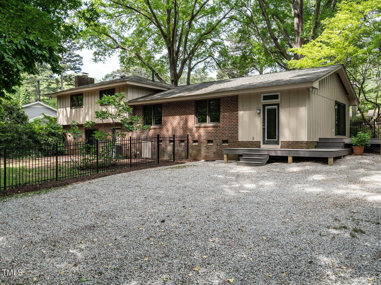 2204 Myron Drive Raleigh, NC 27607 - Photo 35 of 57 Large overhangs allow for cooler temps in Summer, more light in Winter, and no gutters to clean.