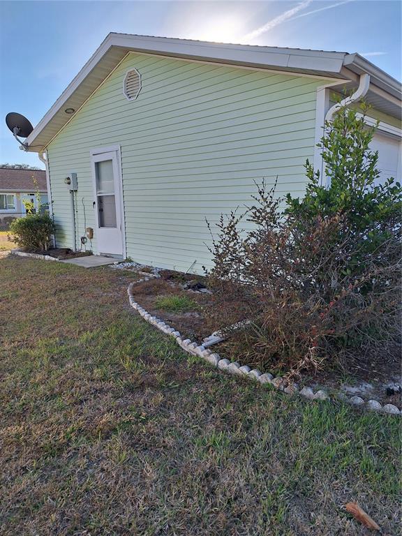 8202 Southwest 108th Pl Road Ocala, FL 34481 - Photo 19 of 22 SIDE OF HOUSE