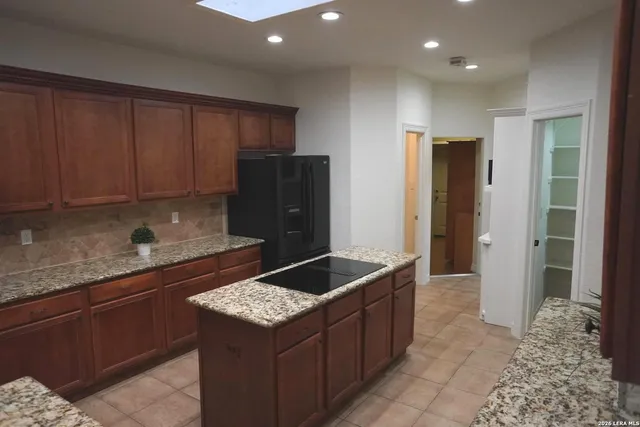 an empty room with closet area