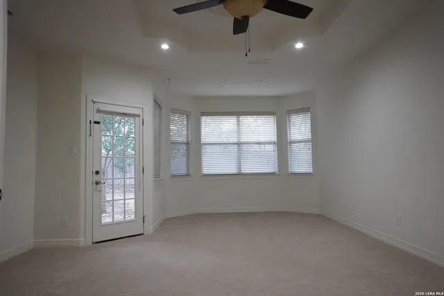 a bathroom with a sink a mirror and a toilet