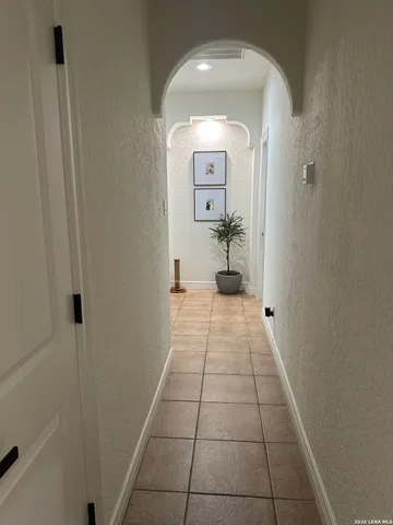 a house with trees in the background