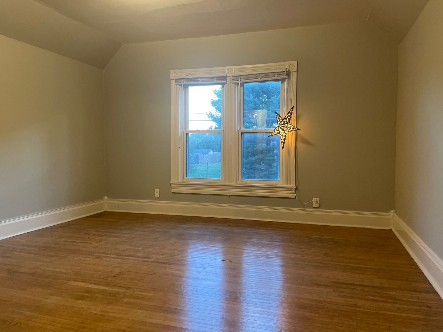 202 Witt Park Road Sidney, IL 61877 - Photo 22 of 49 a view of empty room with wooden floor and fan