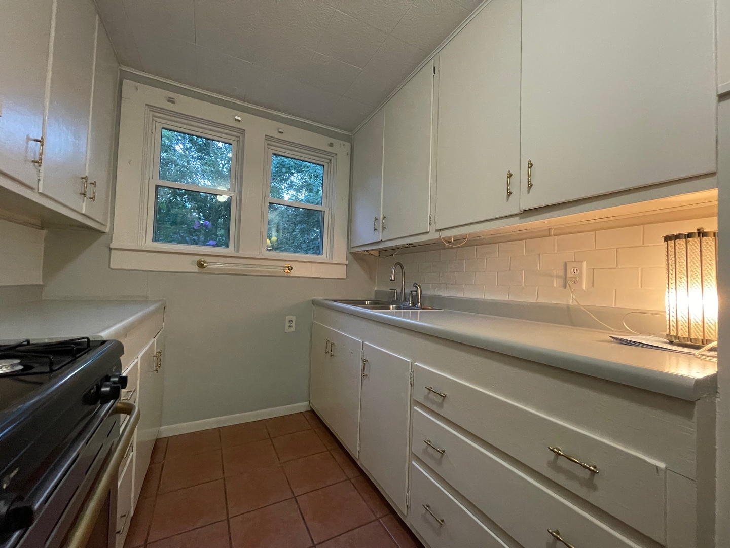 202 Witt Park Road Sidney, IL 61877 - Photo 23 of 49 a kitchen with a sink cabinets and window
