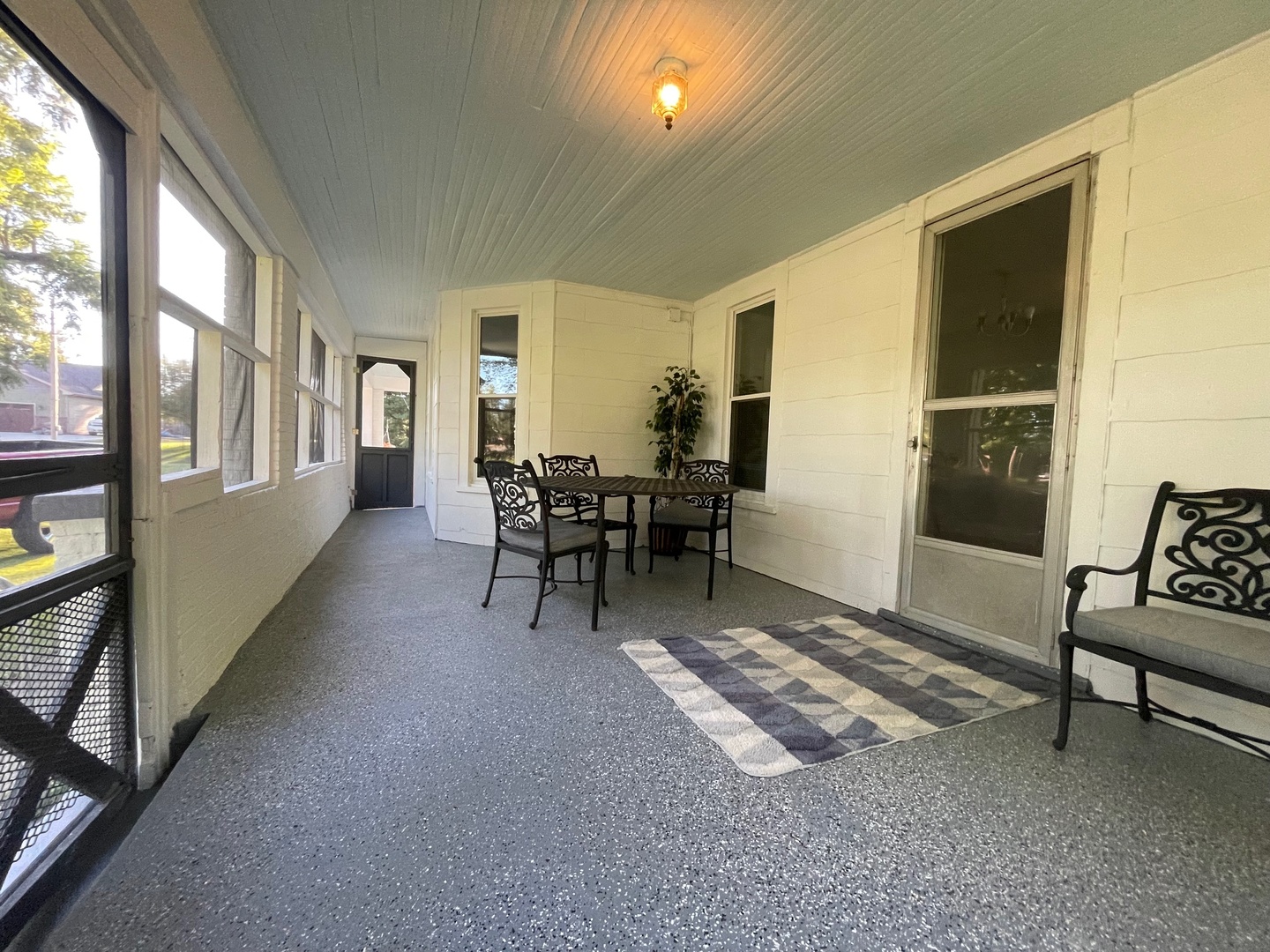 202 Witt Park Road Sidney, IL 61877 - Photo 32 of 49 a living room with furniture and a table