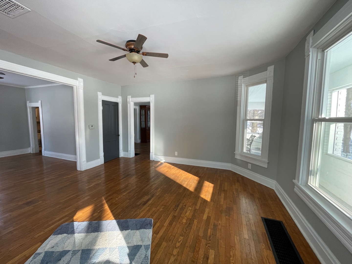 202 Witt Park Road Sidney, IL 61877 - Photo 4 of 49 a view of empty room with wooden floor and fan