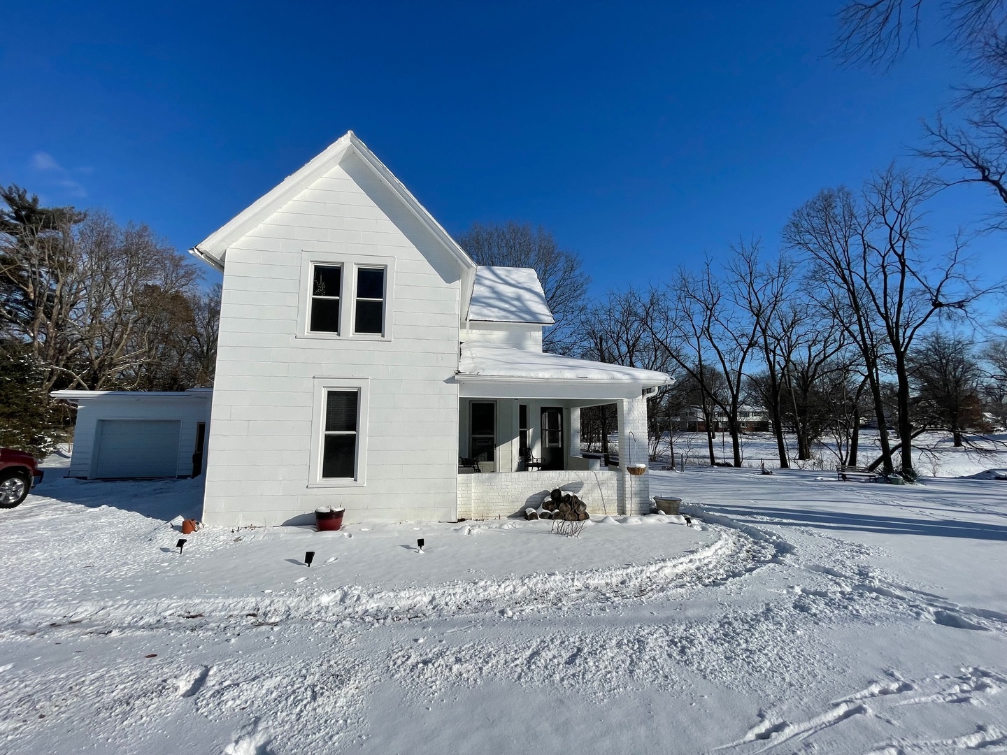 202 Witt Park Road Sidney, IL 61877 - Photo 42 of 49 a front view of a house with a yard