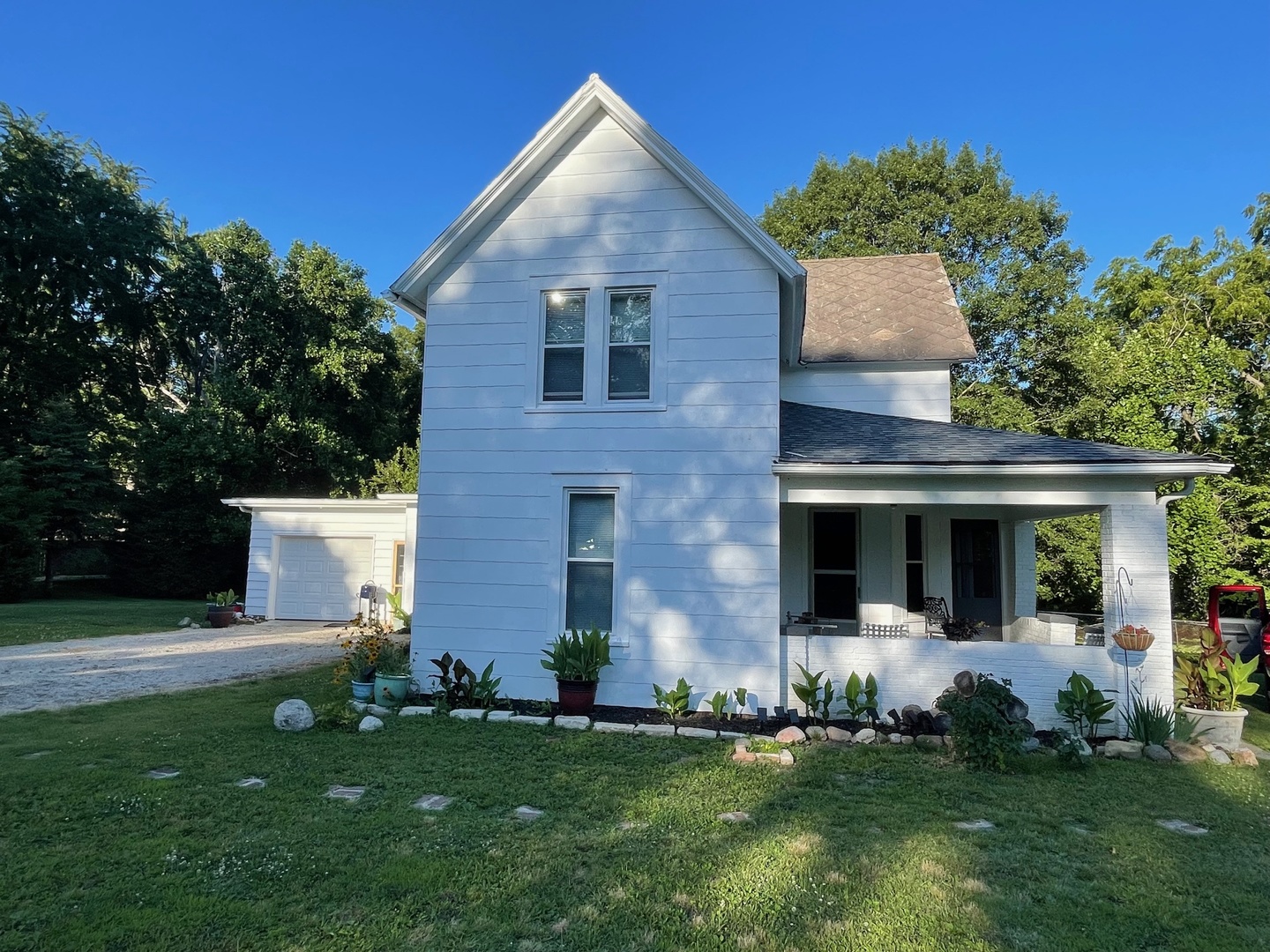 202 Witt Park Road Sidney, IL 61877 - Photo 46 of 49 a front view of a house with a yard
