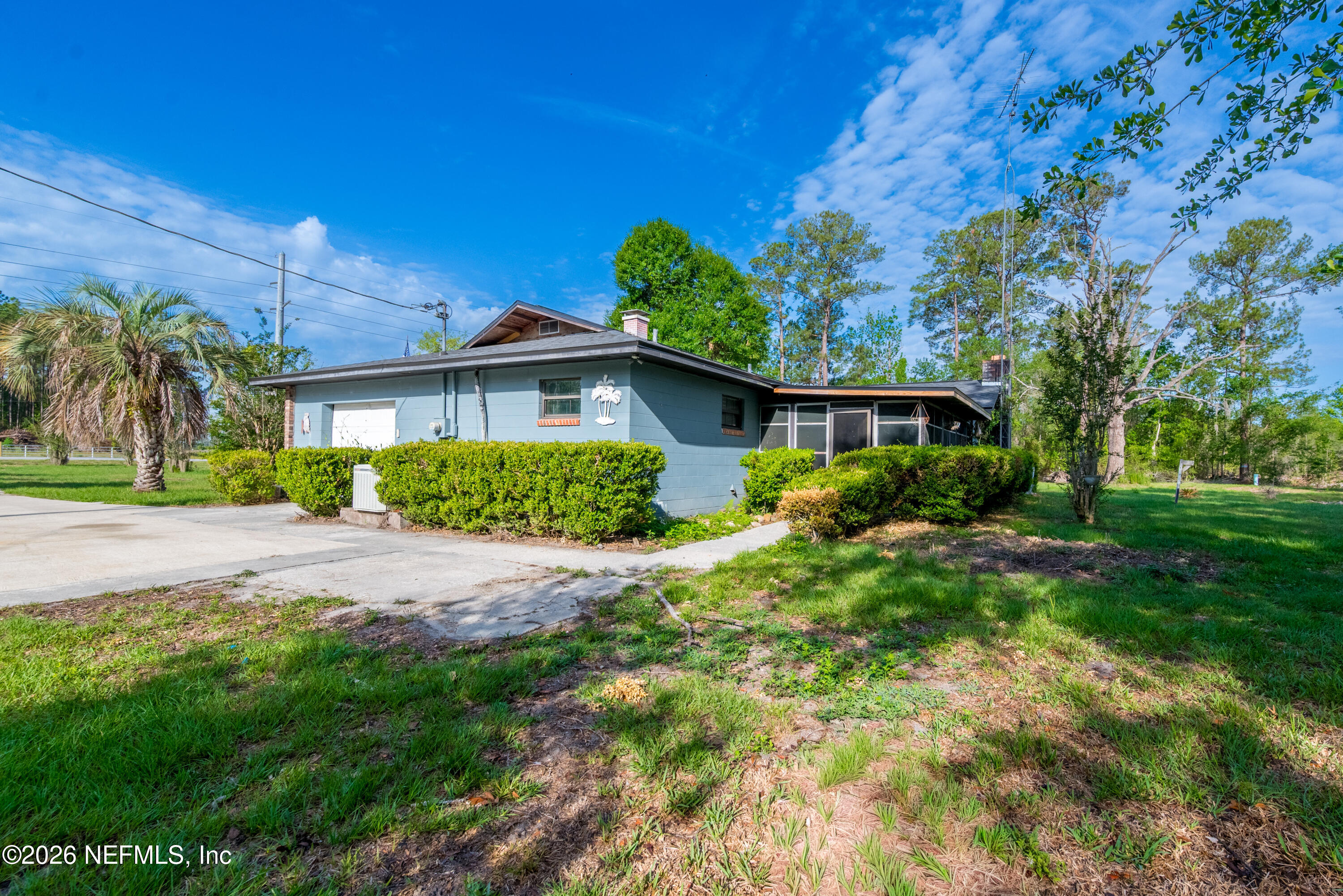 12781 Highway 100 Lake Butler, FL 32054 - Photo 11 of 100 a front view of a house with a yard