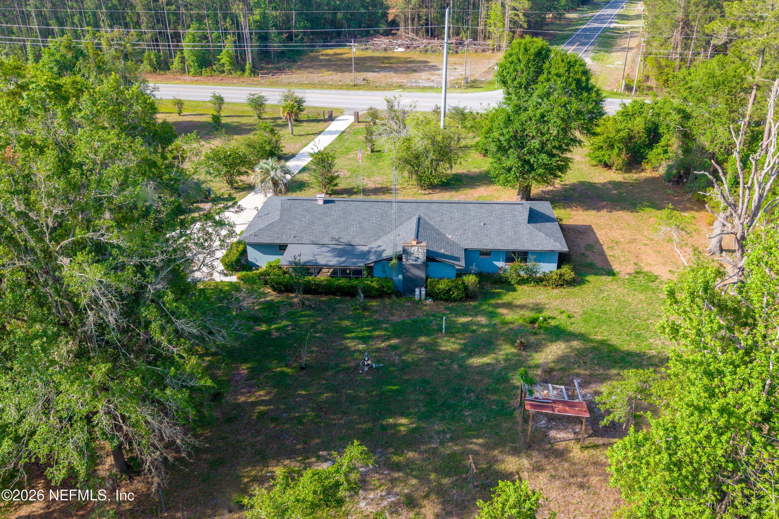 12781 Highway 100 Lake Butler, FL 32054 - Photo 43 of 100 an aerial view of residential houses with outdoor space and trees