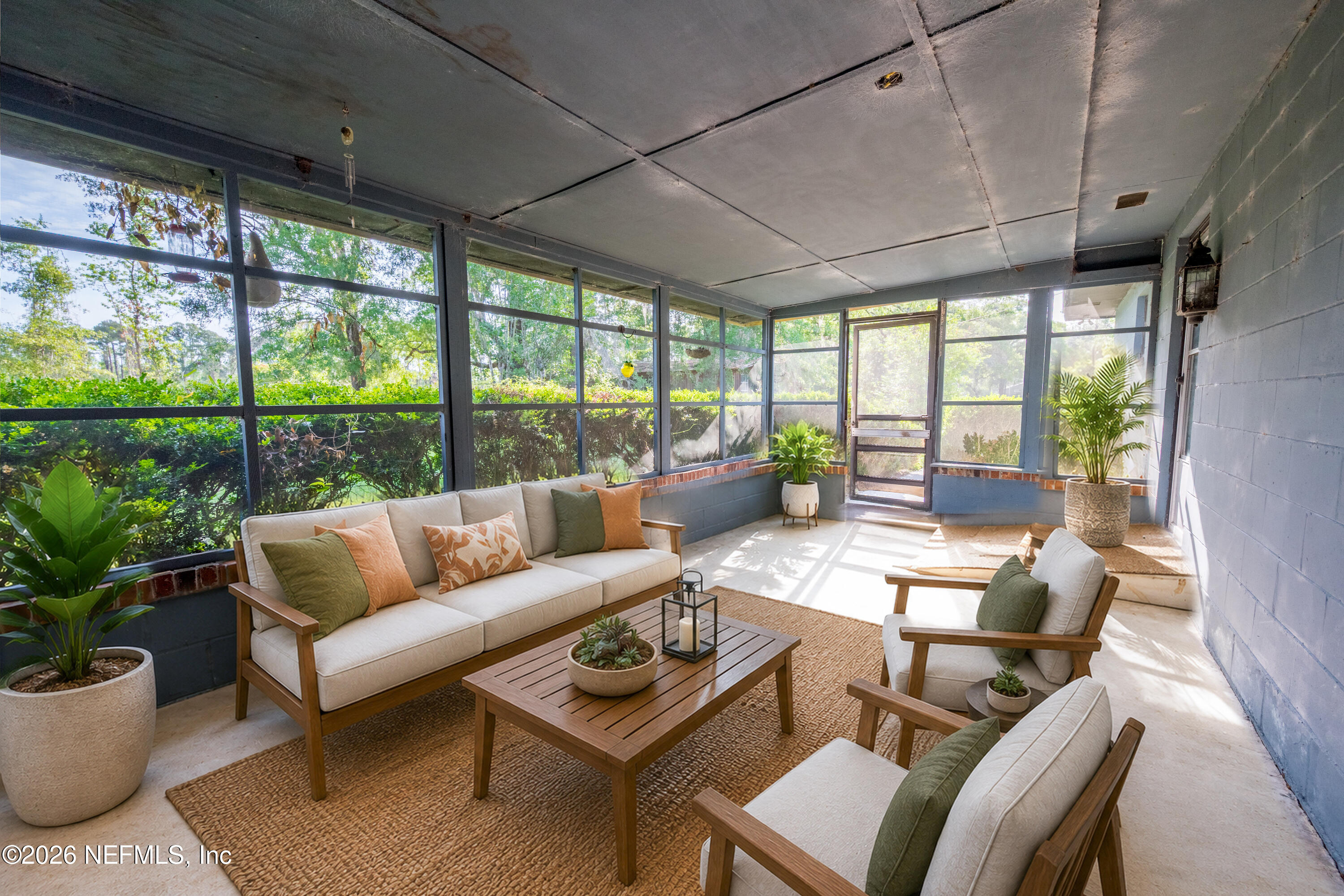 12781 Highway 100 Lake Butler, FL 32054 - Photo 50 of 100 a living room with furniture and a potted plant