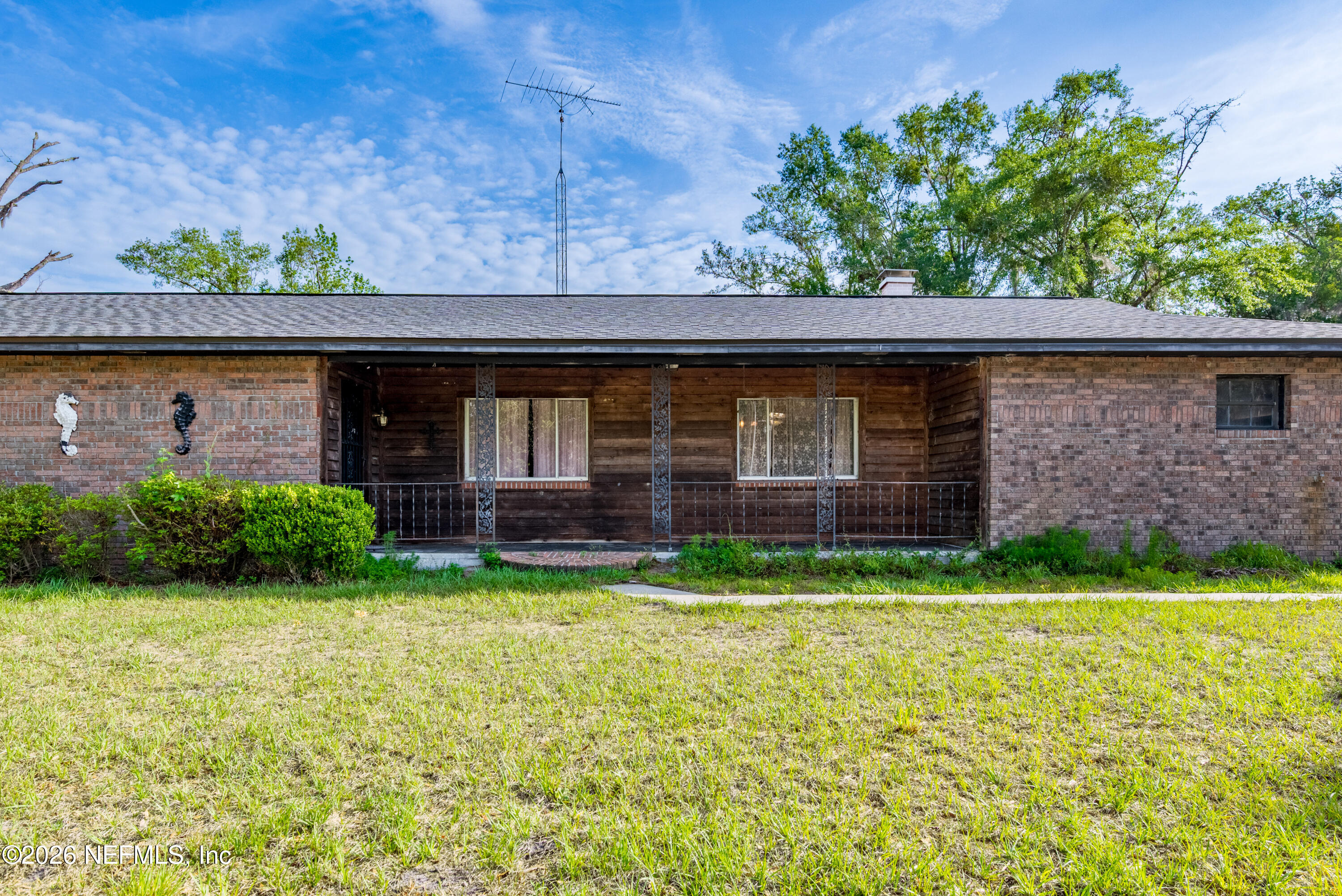 12781 Highway 100 Lake Butler, FL 32054 - Photo 5 of 100 a view of a house with a yard