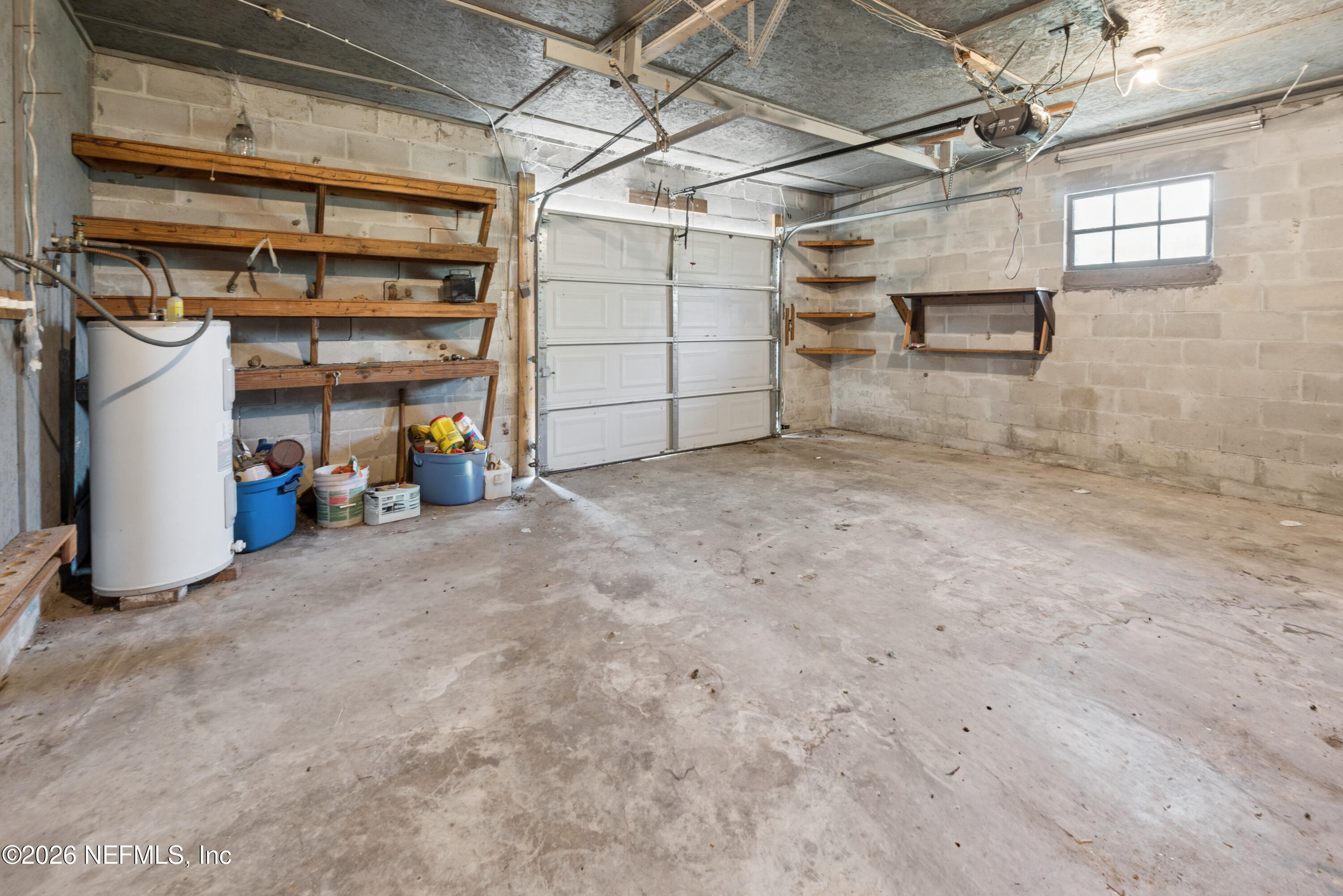 12781 Highway 100 Lake Butler, FL 32054 - Photo 76 of 100 a view of a garage with storage