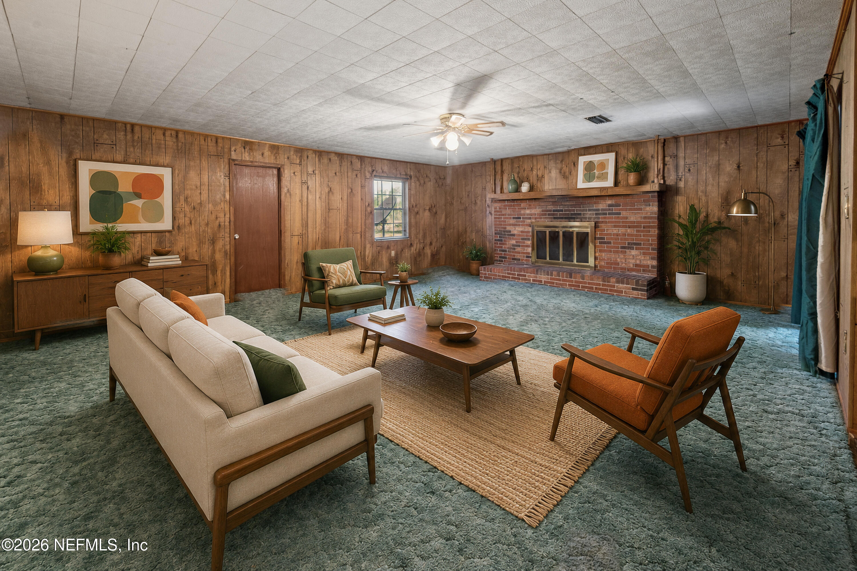 12781 Highway 100 Lake Butler, FL 32054 - Photo 78 of 100 a living room with furniture a fireplace and a flat screen tv