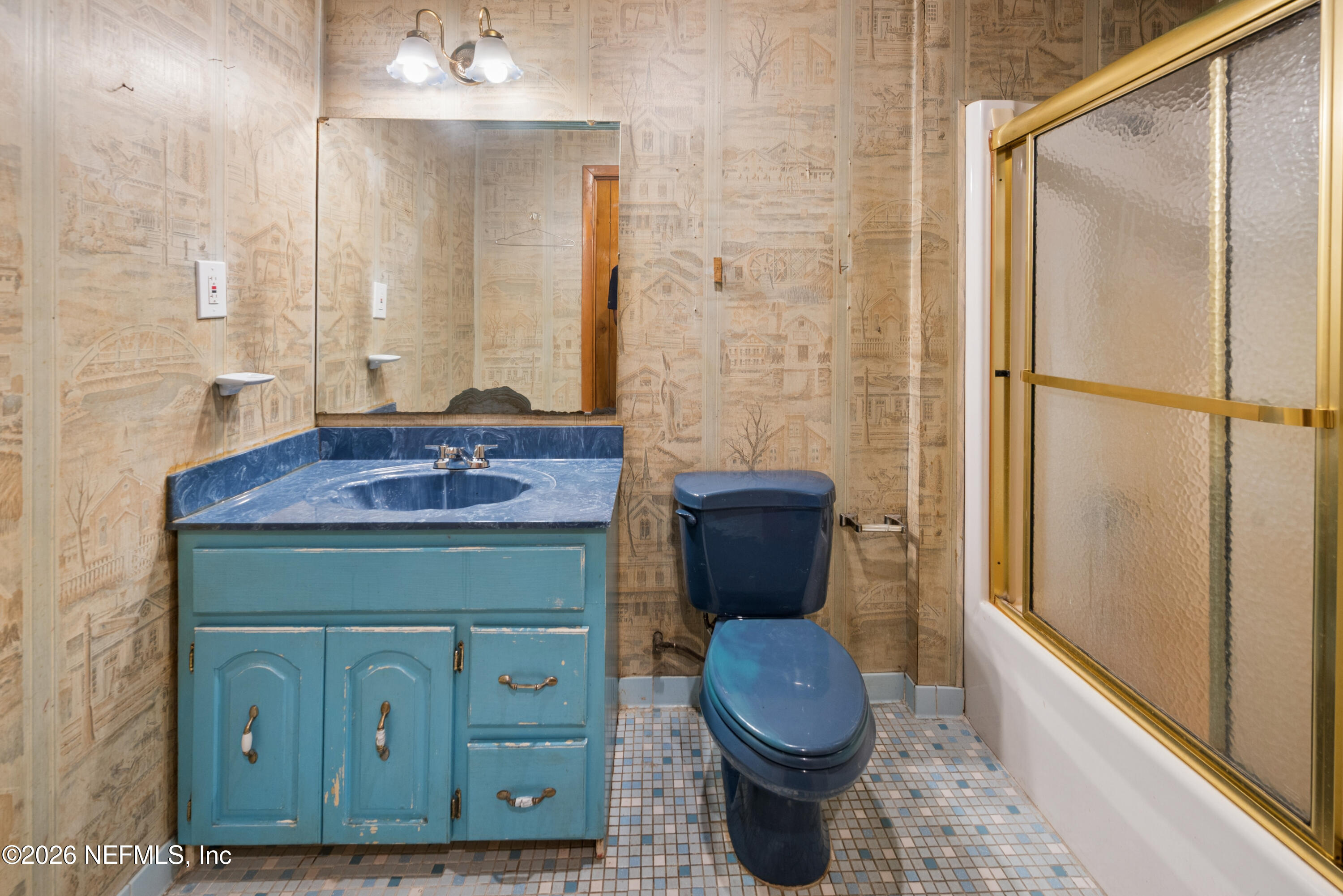 12781 Highway 100 Lake Butler, FL 32054 - Photo 88 of 100 a bathroom with a toilet and a sink