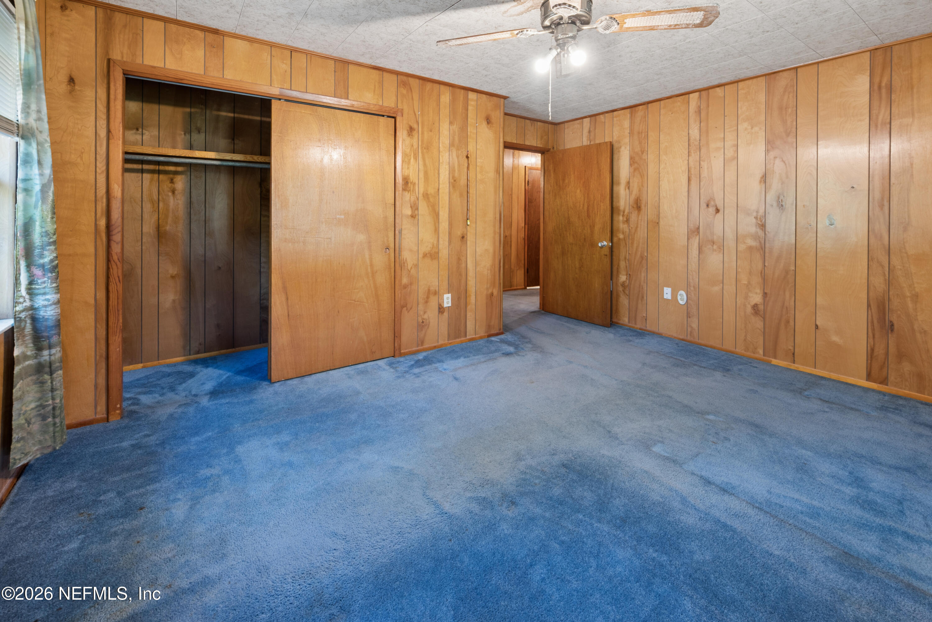 12781 Highway 100 Lake Butler, FL 32054 - Photo 93 of 100 a view of an empty room with a chandelier