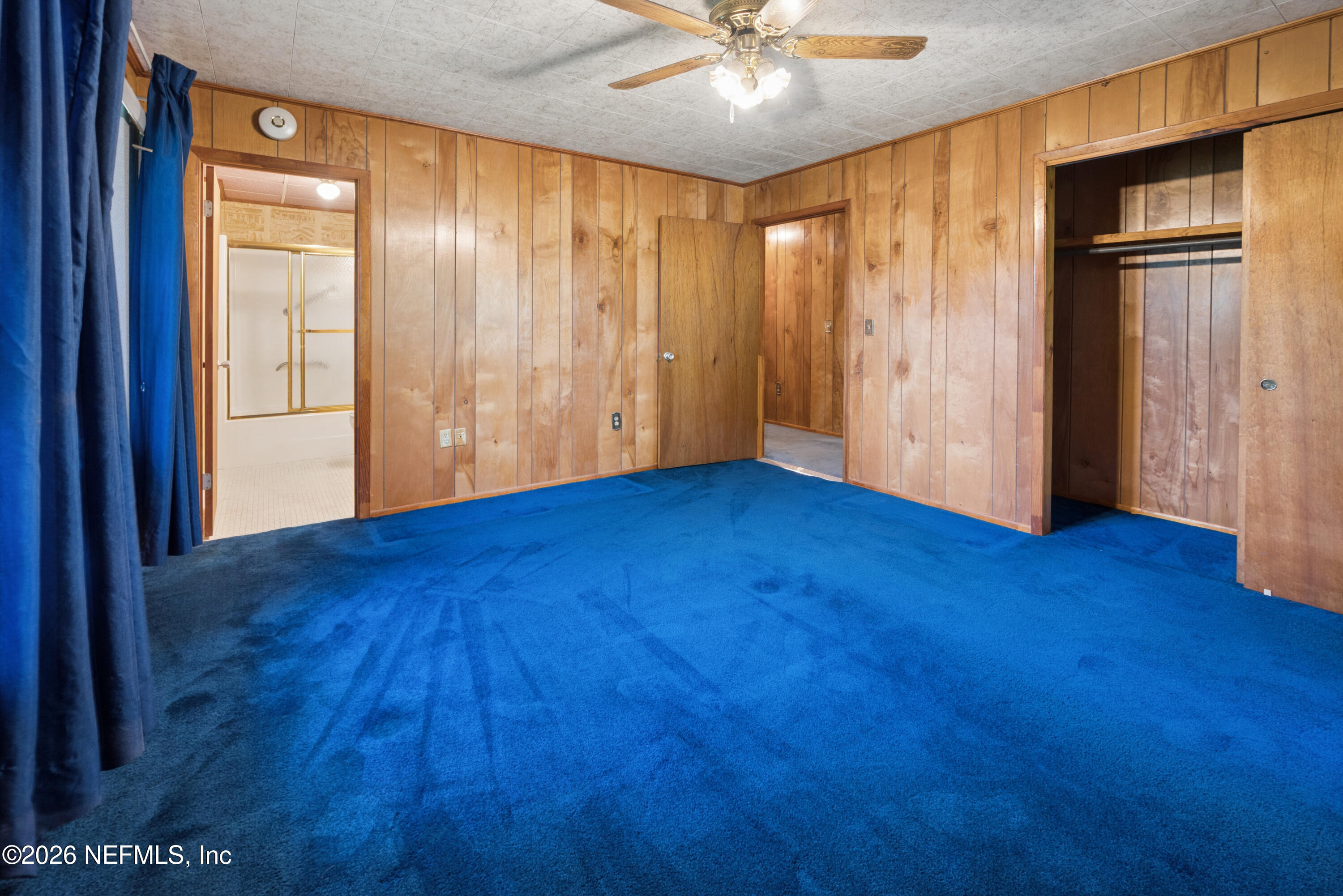 12781 Highway 100 Lake Butler, FL 32054 - Photo 97 of 100 a view of an empty room with wooden floor and a window