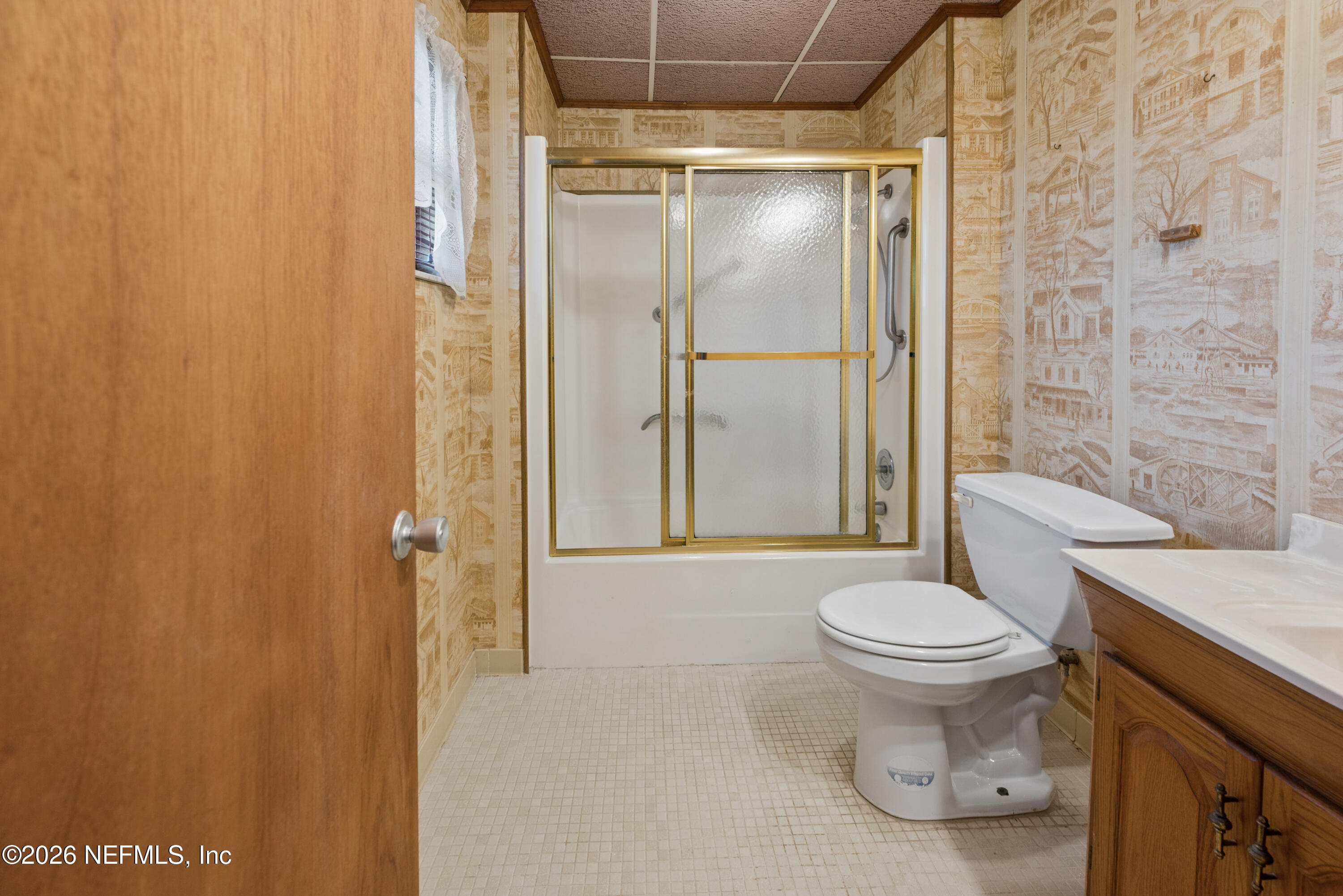 12781 Highway 100 Lake Butler, FL 32054 - Photo 99 of 100 a bathroom with a shower and a toilet