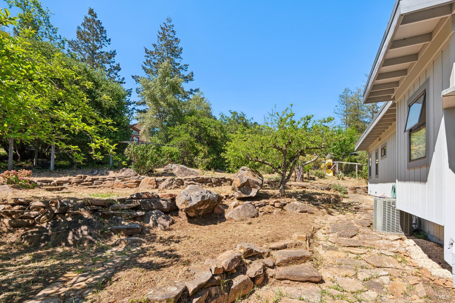 1475 Los Olivos Road Santa Rosa, CA 95404 - Photo 49 of 51 a view of a yard with a house