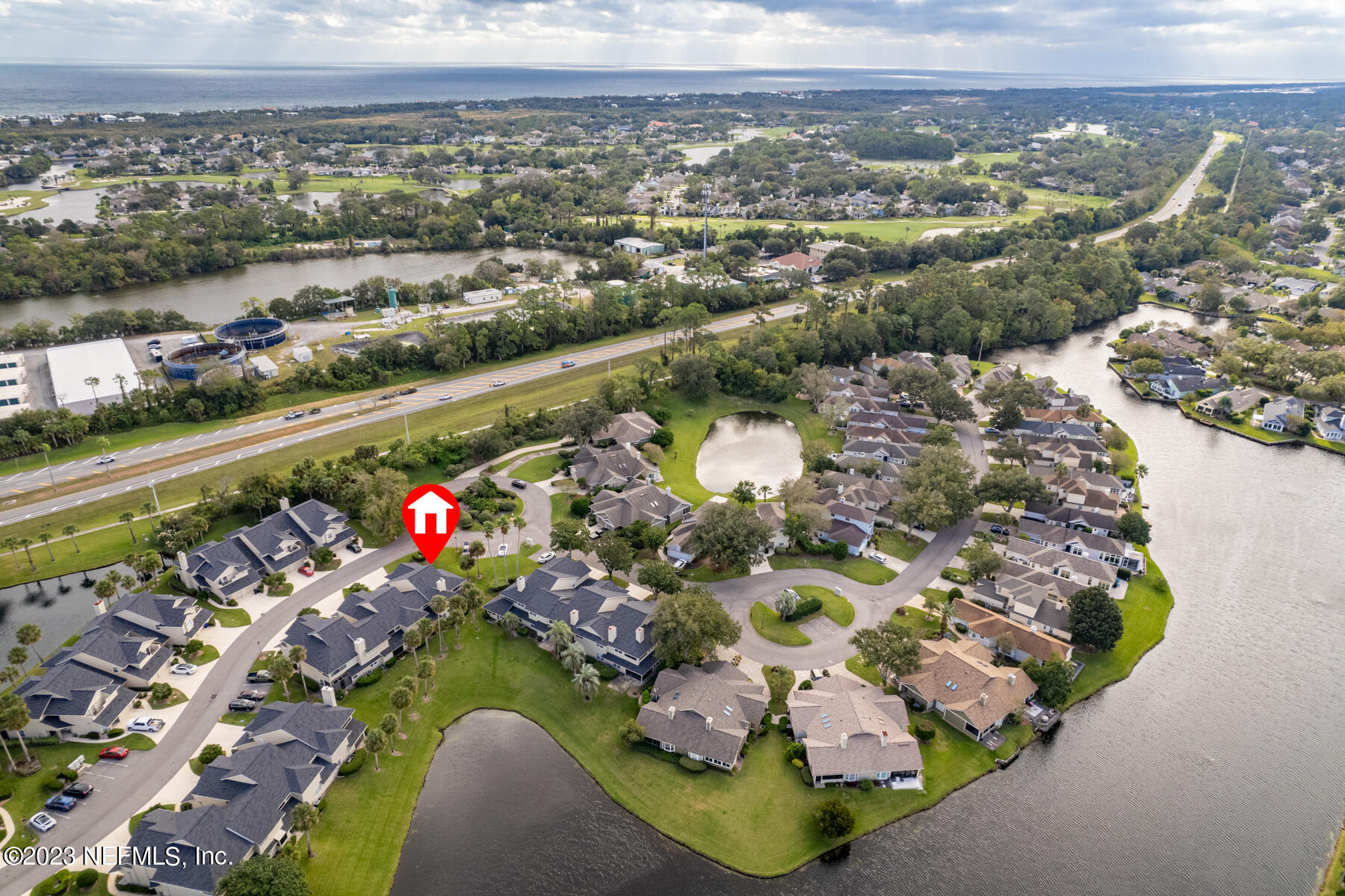601 Tournament Road Ponte Vedra Beach, FL 32082 - Photo 25 of 31 an aerial view of a house with a ocean view