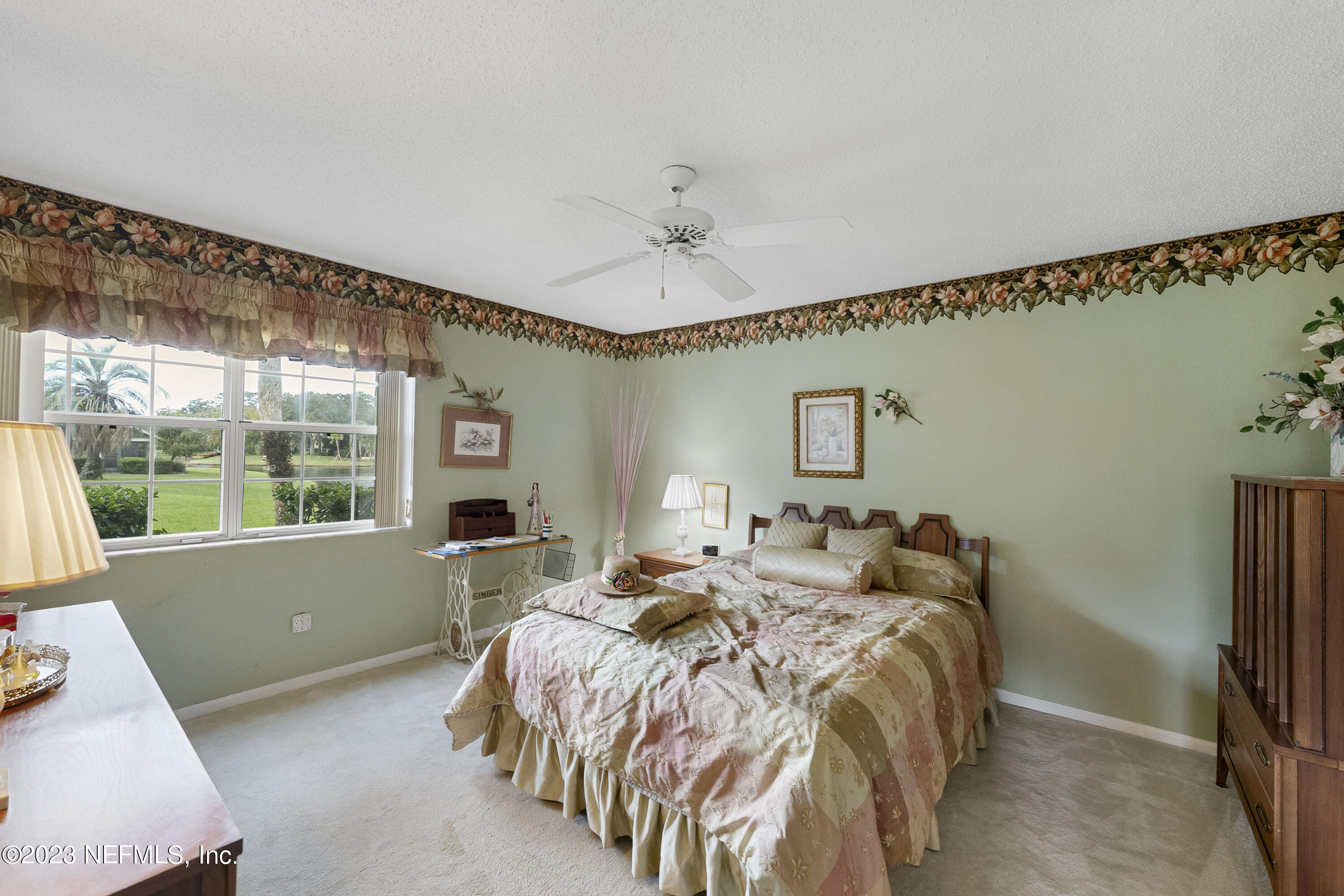 601 Tournament Road Ponte Vedra Beach, FL 32082 - Photo 10 of 31 a bed sitting in a bedroom next to a window