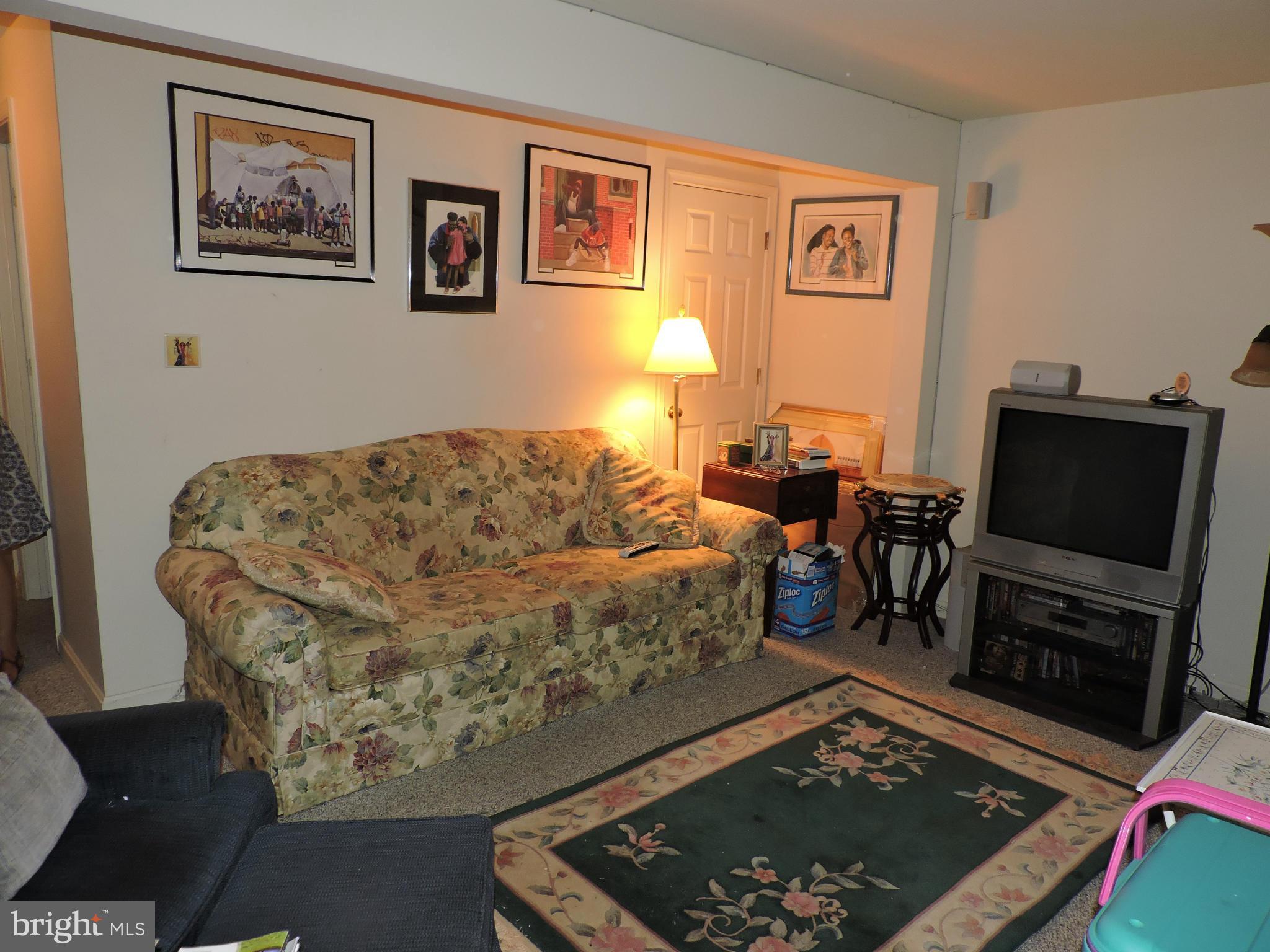 41 Morton Ridge Warrenton, VA 20186 - Photo 8 of 14 a living room with furniture and a flat screen tv