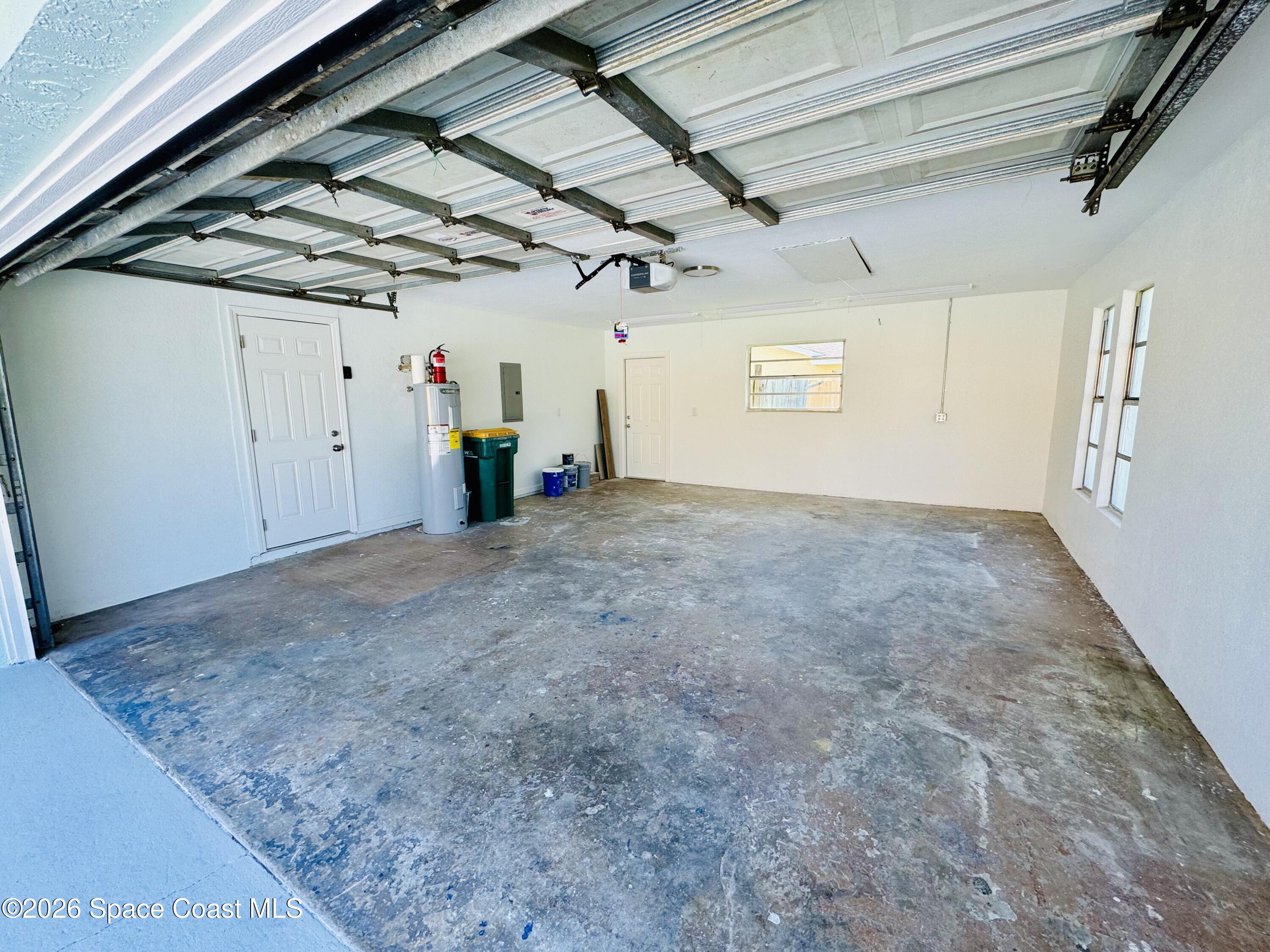 1910 Tallridge Road Melbourne, FL 32935 - Photo 26 of 34 garage front