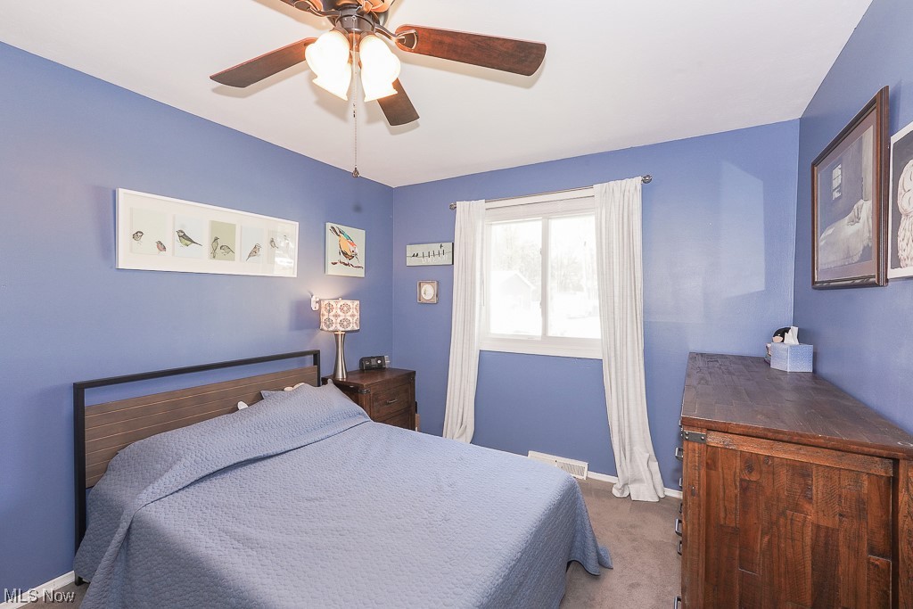 1127 Garden Road Willoughby, OH 44094 - Photo 23 of 33 Carpeted bedroom featuring ceiling fan