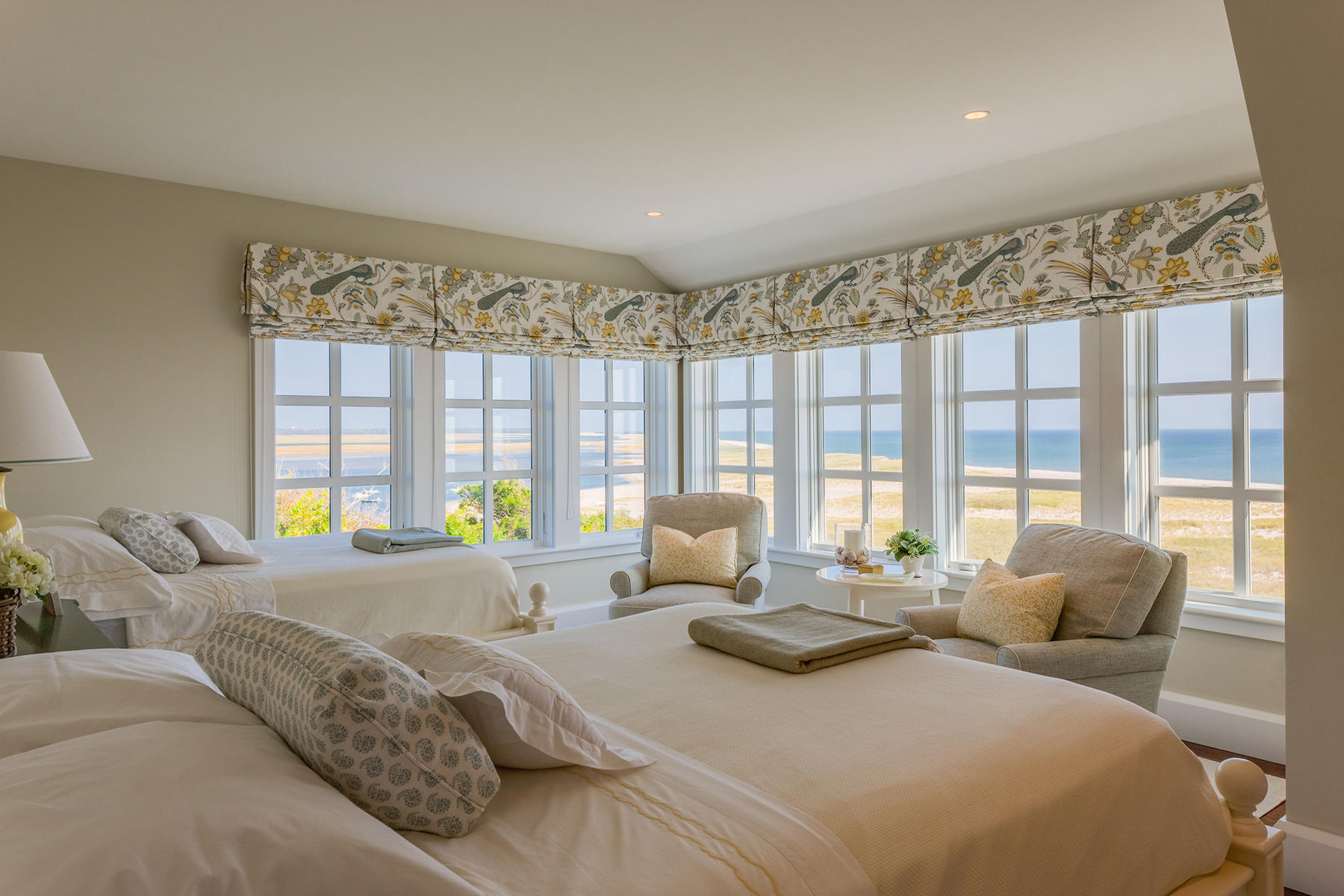 51 Nauset Road Orleans, MA 02653 - Photo 15 of 33 a bedroom with a bed and large windows