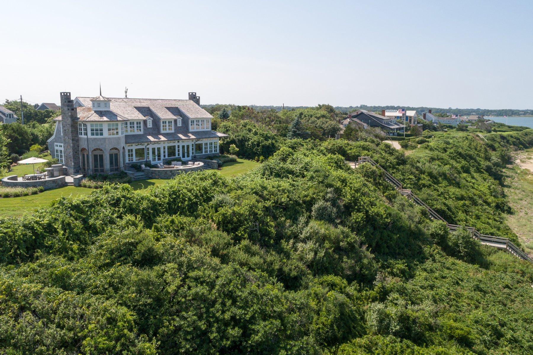 51 Nauset Road Orleans, MA 02653 - Photo 30 of 33 a view of a big house with a big yard and large trees
