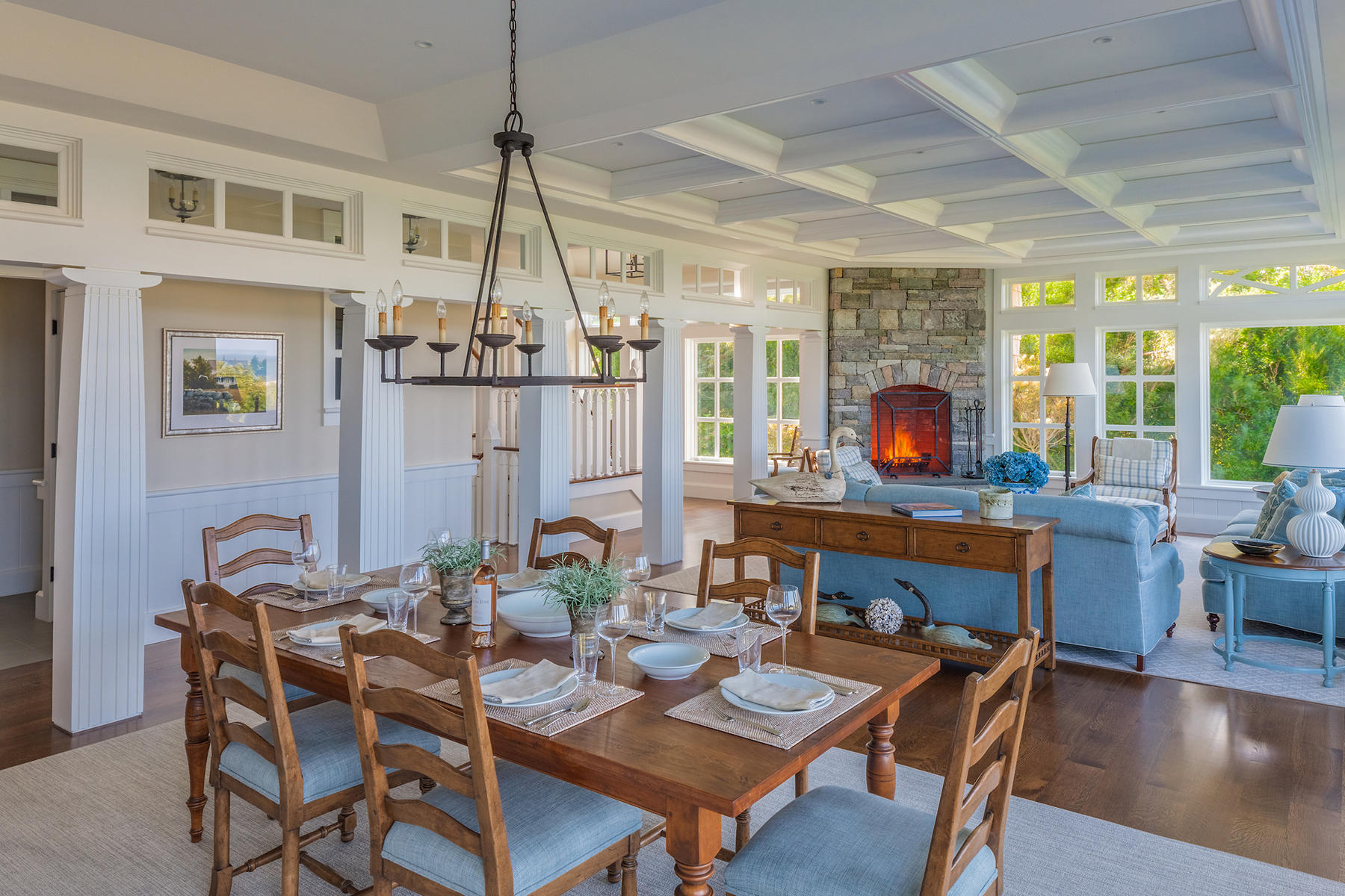 51 Nauset Road Orleans, MA 02653 - Photo 8 of 33 a dining room with furniture a chandelier and wooden floor