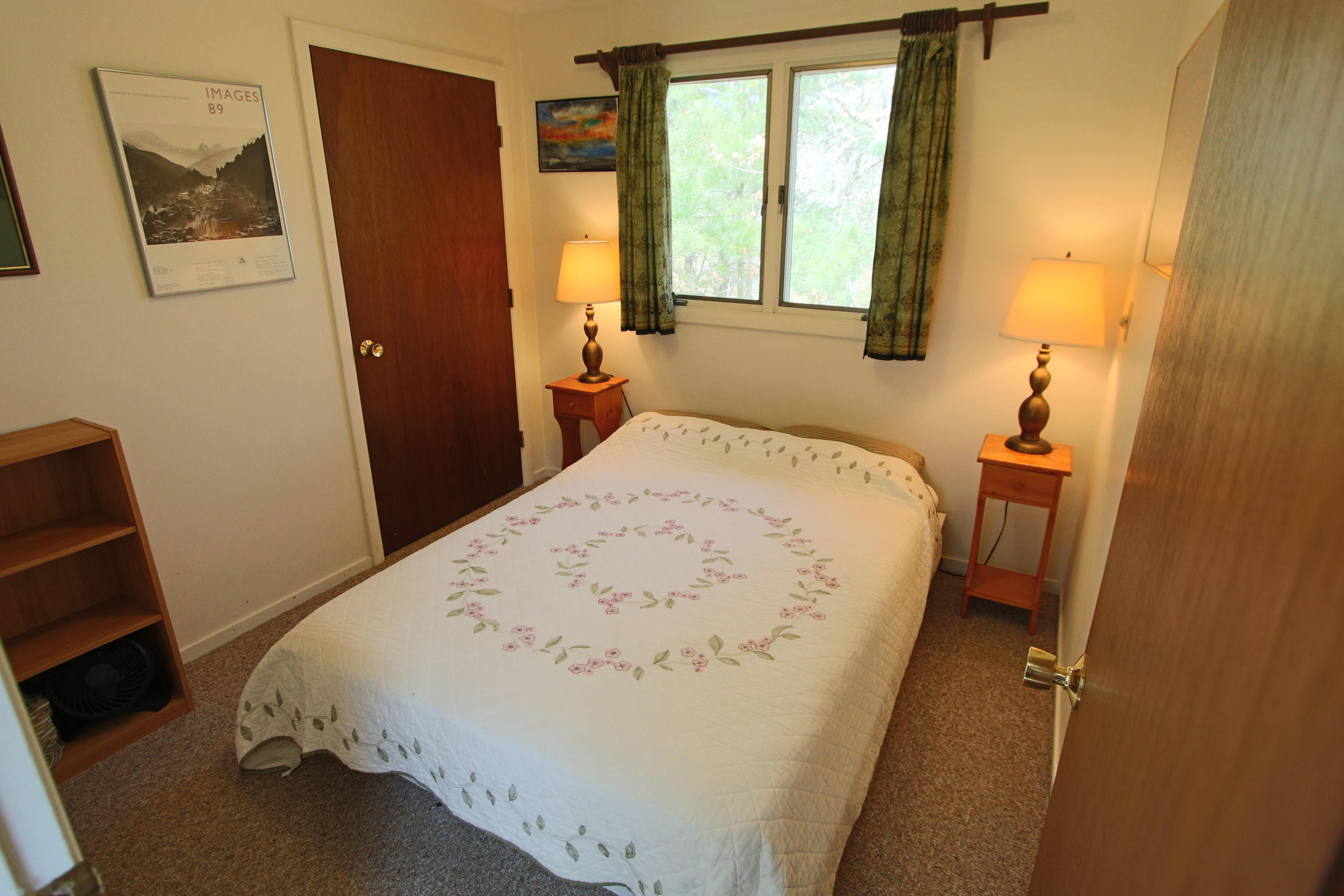 5 4th Of July Road Truro, MA 02666 - Photo 20 of 33 a bed sitting in a bedroom next to a window