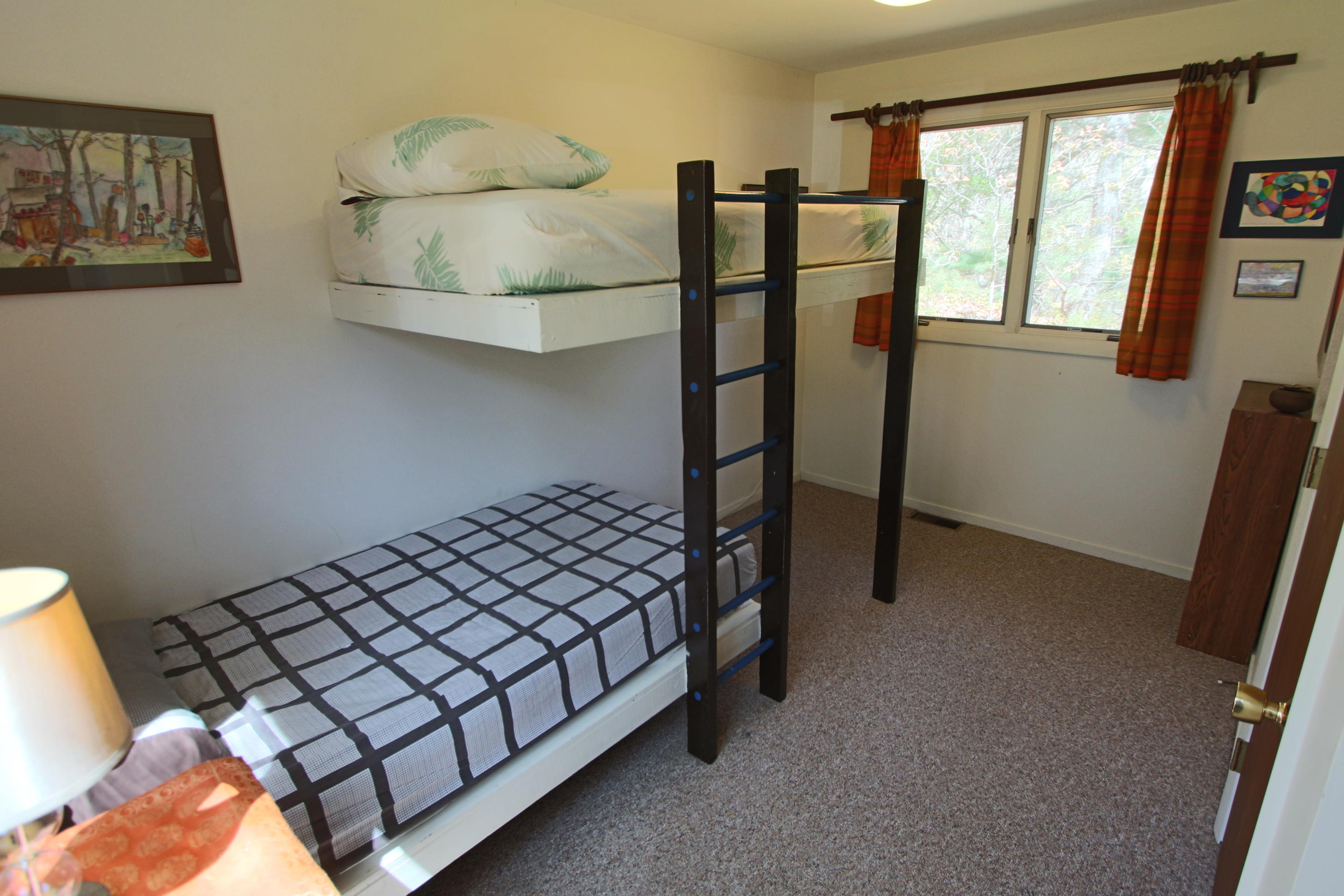 5 4th Of July Road Truro, MA 02666 - Photo 21 of 33 a bed room with a bed and a window