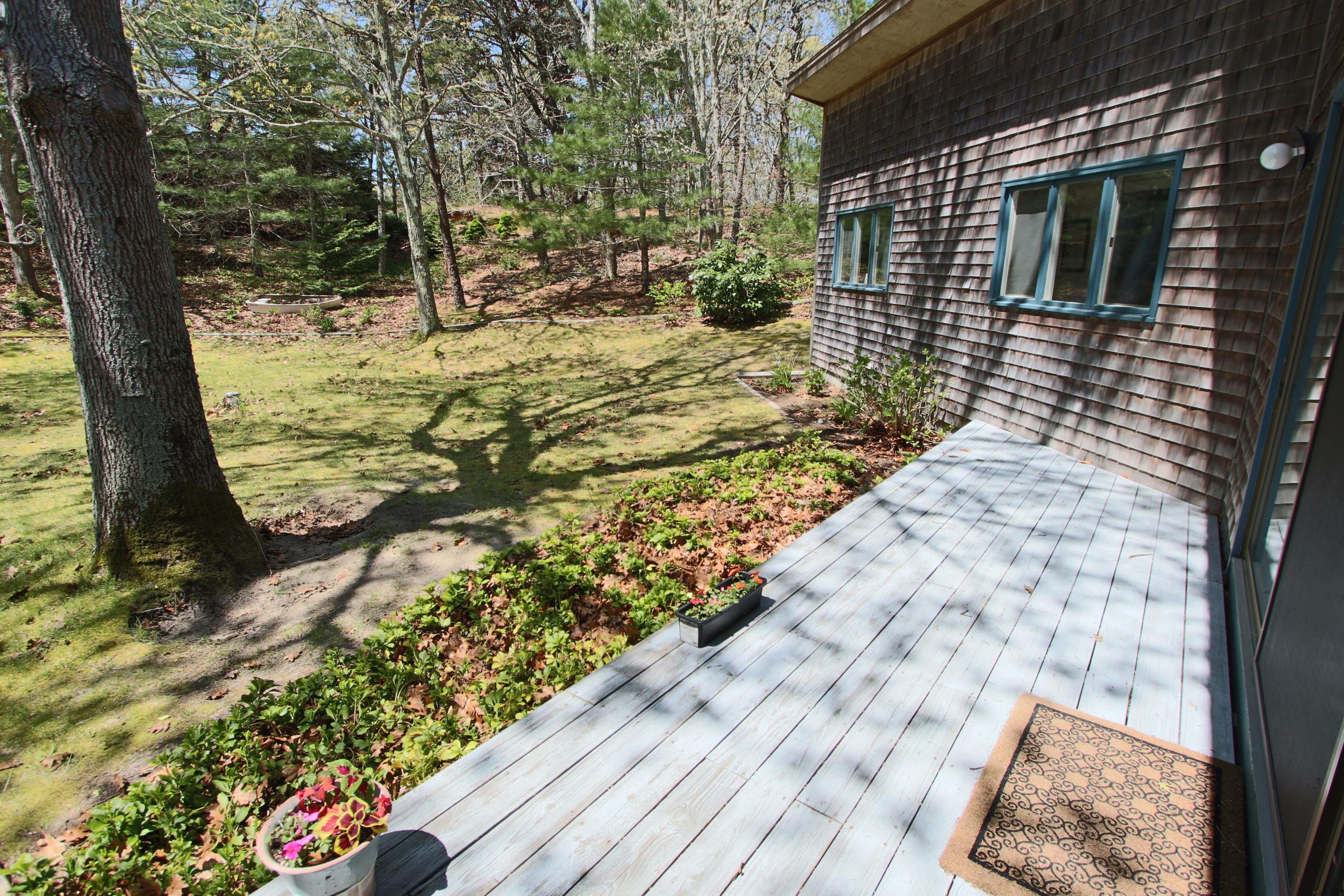 5 4th Of July Road Truro, MA 02666 - Photo 29 of 33 a view of a backyard of the house