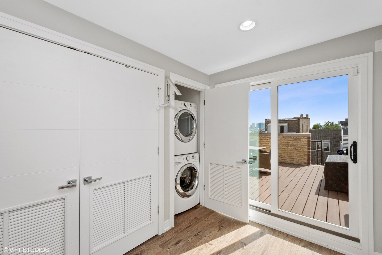 1219 North Cleaver Street, Unit 2 Chicago, IL 60642 - Photo 13 of 23 a view of living room washer and dryer