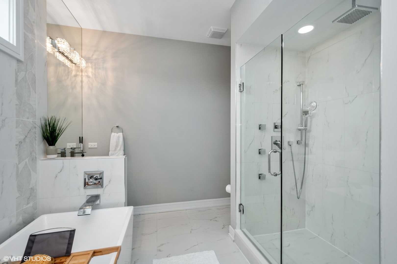 1219 North Cleaver Street, Unit 2 Chicago, IL 60642 - Photo 8 of 23 a bathroom with a sink a toilet and shower