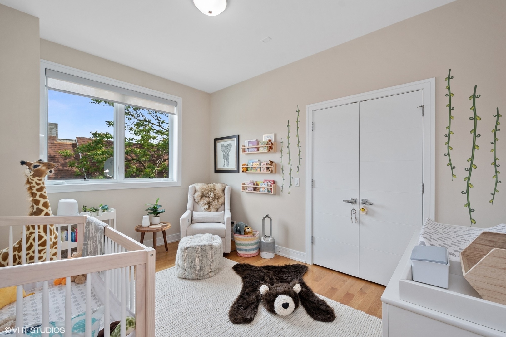 1219 North Cleaver Street, Unit 2 Chicago, IL 60642 - Photo 10 of 23 a living room with furniture and a window