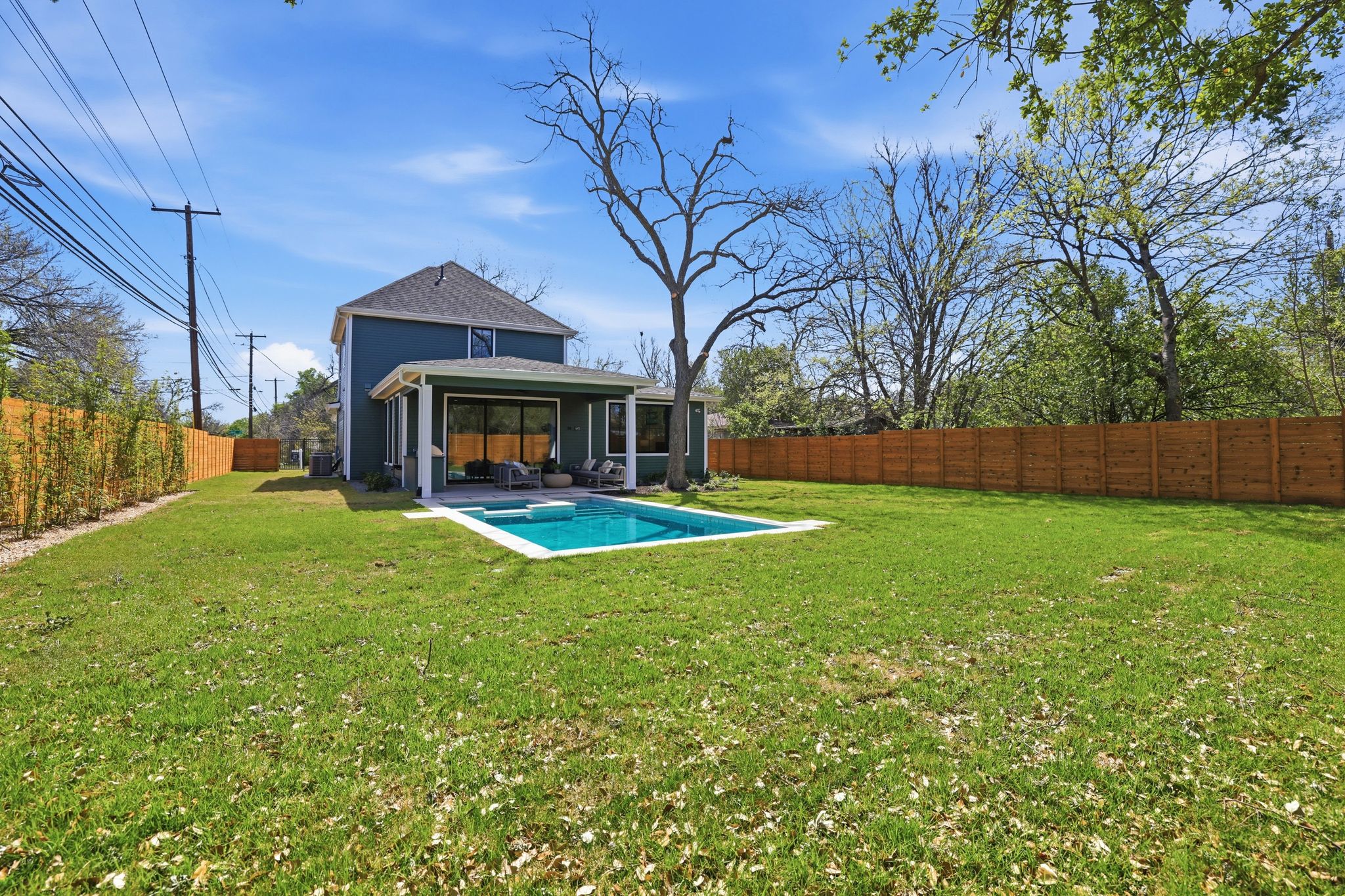 4500 Jinx Avenue Austin, TX 78745 - Photo 40 of 40 Rear view of property with a patio and a fenced backyard
